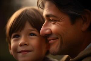 Happy father and son looking at each other in the park. photo