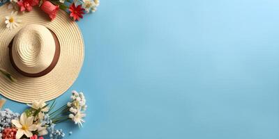 Hat and sunglasses on blue background with copyspace. photo