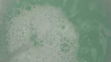 Texture of white soap foam with abstract soap bubbles background. video