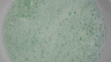 Texture of white soap foam with abstract soap bubbles background. video