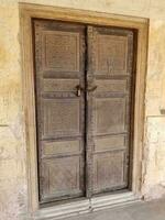 Old wood texture door at lahore fort photo