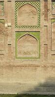 The conserved picture wall in Badshahi fort close picture of wall texture photo