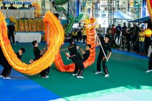 Ho Chi Minh, Viet Nam - 22 April 2023 Dragon dance, celebrate the new year. At the park photo