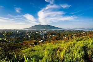 Mountains during morning. Beautiful natural landscape in the summer time with fog photo