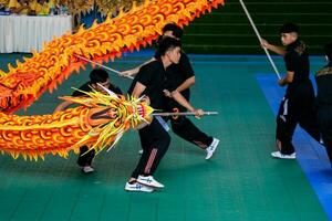 Ho Chi Minh, Viet Nam - 22 April 2023 Dragon dance, celebrate the new year. At the park photo