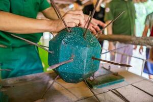 The Cu Chi tunnels. The staff showing use the trap in Cu Chi tunnels. It's used in Vietnam war. Famous tourist attraction in Vietnam. Stock photo