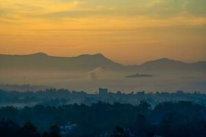 Layer of fog and cloud mountain valley landscape photo