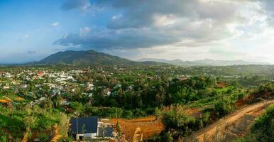 Majestic sunset in the mountain landscape in Dai Binh mountain valley, Vietnam photo