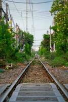 Incredible view of train passing through a narrow street, the Hanoi Old Quarter. Stock photo