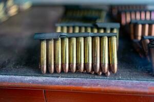 Preparing for reloading, main focus on ballistic point bullets, soft focus photo