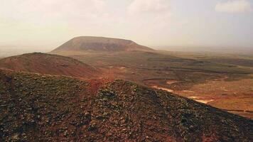 Approaching the extinct crater of a volcano on the island of Fuerteventura. video