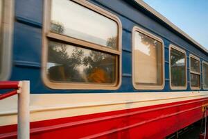 Incredible view of train passing through a narrow street, the Hanoi Old Quarter. Stock photo