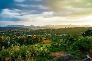 Majestic sunset in the mountain landscape in Dai Binh mountain valley, Vietnam photo