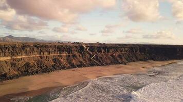 The camera flies around the high rocky shore of the island of Fuerteventura. video