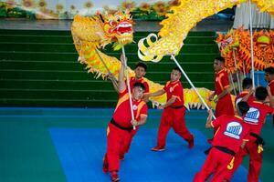 Ho Chi Minh, Viet Nam - 22 April 2023 Dragon dance, celebrate the new year. At the park photo