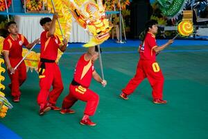 Ho Chi Minh, Viet Nam - 22 April 2023 Dragon dance, celebrate the new year. At the park photo