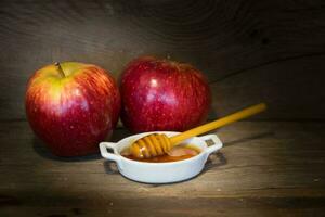 Apples and honey symbol of Rosh Hashanah, jewish new year photo