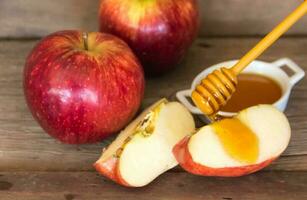 Apples and honey symbol of Rosh Hashanah, jewish new year photo