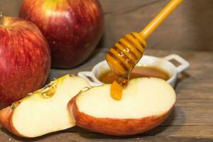 Apples and honey symbol of Rosh Hashanah, jewish new year photo