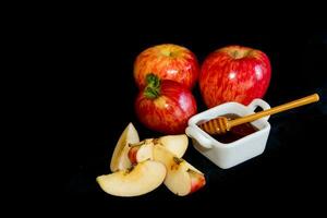 manzanas y miel símbolo de rosh hashaná, judío nuevo año foto