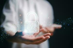 Protection network security computer and safe your data concept, Businesswoman holding shield protect icon. Cybersecurity and privacy concepts photo