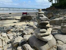 Slacked rocks on a beach photo