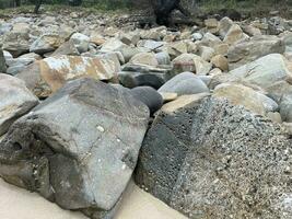 Big rocks at a beach photo