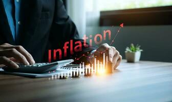 Businessman analyzes inflation for business planning in an inflationary economy, and inflation control, US dollar inflation, causes, effects, and management strategies for a stable economy photo