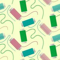 Seamless pattern using sewing thread. reels with threads in retro style on a yellow background. Colored threads are scattered on the surface. Suitable for background in sewing departments vector