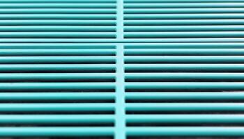 Striped metal blinds on modern window frame create abstract pattern generated by AI photo