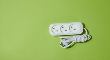 White socket on a green background, top view photo