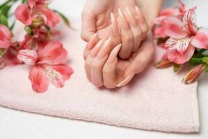 Elegant pastel pink natural manicure. photo