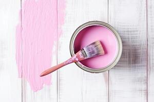 . Paint brush with an open can. photo