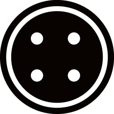 Round black and white button.