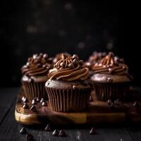 Choco Cupcakes on Wooden Surface. photo