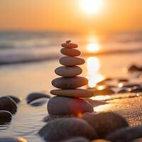 Beach Pebbles Stack at Sunrise. photo