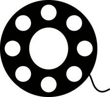 Black and white round bobbin with thread. Glyph icon or symbol. vector