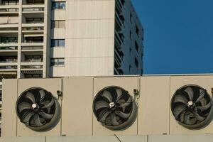 a heat pump on a house wall photo