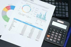 Budget planning concept. Business  Planning Strategy Analysis discussing new plan financial graph data. Work with document graphs Concept. photo