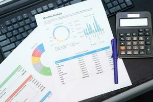 Budget planning concept. Business  Planning Strategy Analysis discussing new plan financial graph data. Work with document graphs Concept. photo