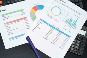 Budget planning concept. Business  Planning Strategy Analysis discussing new plan financial graph data. Work with document graphs Concept. photo