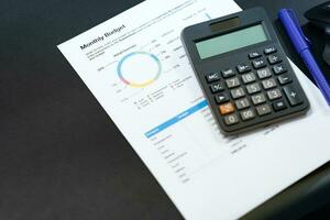 Budget planning concept. Business  Planning Strategy Analysis discussing new plan financial graph data. Work with document graphs and calculator Concept. photo