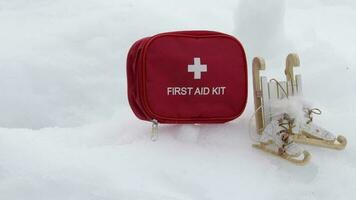 Winter sport equipment and first aid kit in the snow video