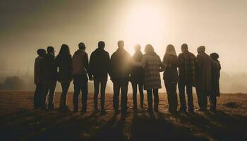 A joyful group of friends embrace in the sunset outdoors generated by AI photo