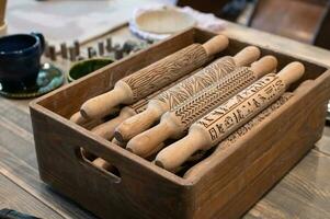 Wooden Curly rolling Pins for clay in a box photo