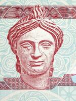 Terracotta woman's head from money photo