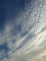 The white clouds on the blue sky are perfect for the background.  Skyscape on Lombok Island, Indonesia photo