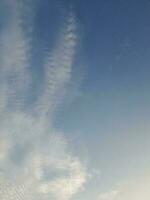 The white clouds on the blue sky are perfect for the background.  Skyscape on Lombok Island, Indonesia photo