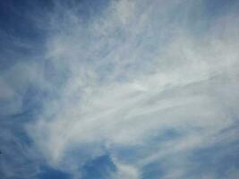 The white clouds on the blue sky are perfect for the background.  Skyscape on Lombok Island, Indonesia photo