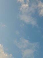 The white clouds on the blue sky are perfect for the background.  Skyscape on Lombok Island, Indonesia photo